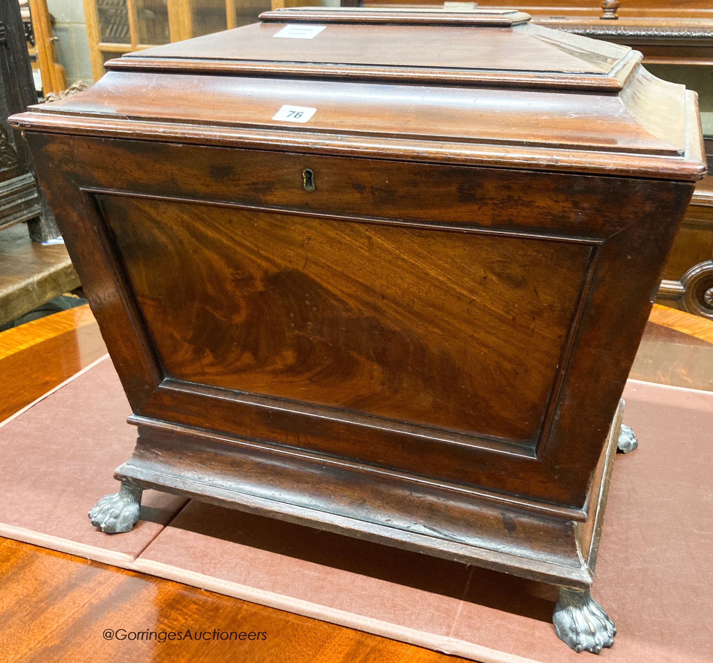 A late Regency mahogany sarcophagus cellarette, width 59cm, depth 43cm, height 50cm